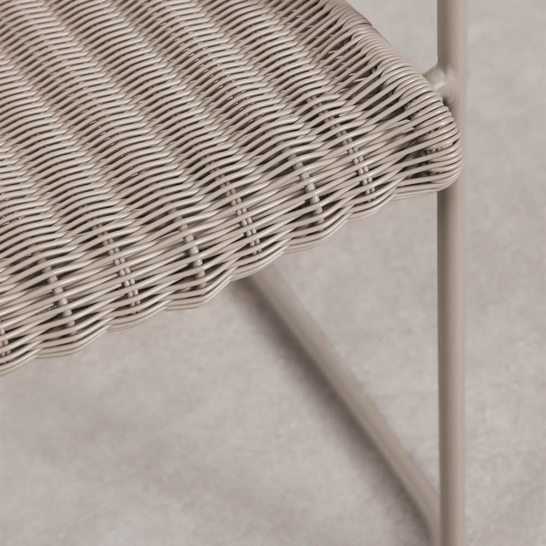 Revia Stackable Dining Chair with Armrests - Synthetic Wicker & Steel